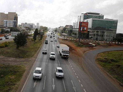 Motorists drive along the Mombasa road highway towards the city centre in Kenya’s capital Nairobi 