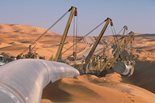 The project required Bechtel to build 330 miles (some 530 kilometers) of pipeline 
