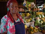 Tabitha Kawala sells fruits and vegetables at Ntinda Market in Kampala, Uganda’s capital city. There is a handwashing station at each entrance for use by the market’s 500+ daily shoppers. 