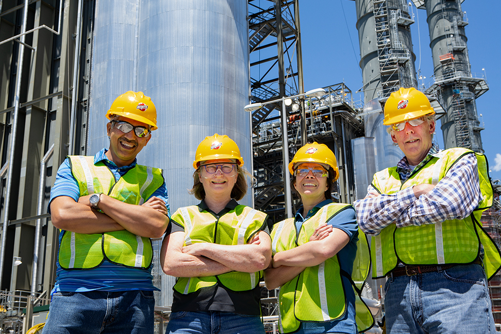 Group of Bechtel Colleagues posing in front of Hummel Power Plant. 