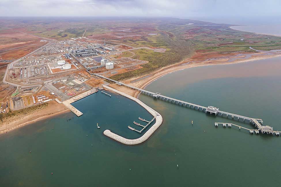 aerial view of LNG facility at the waters edge