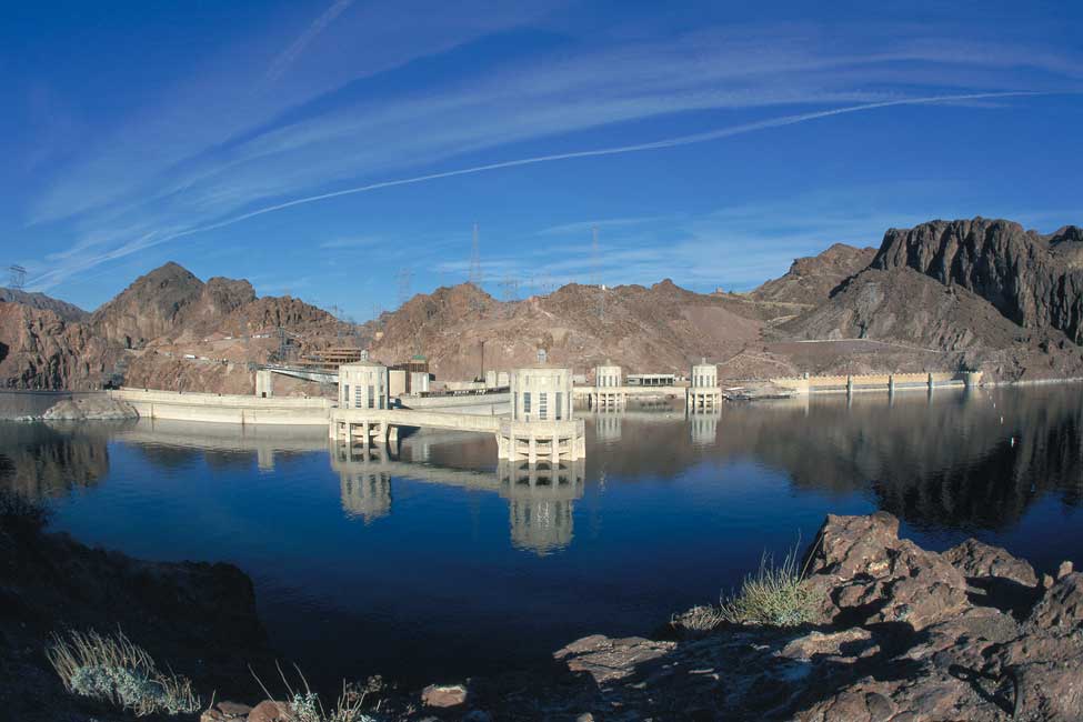 Formed by the dam, Lake Mead is capable of holding more than 9 trillion gallons (34 trillion liters) of water
