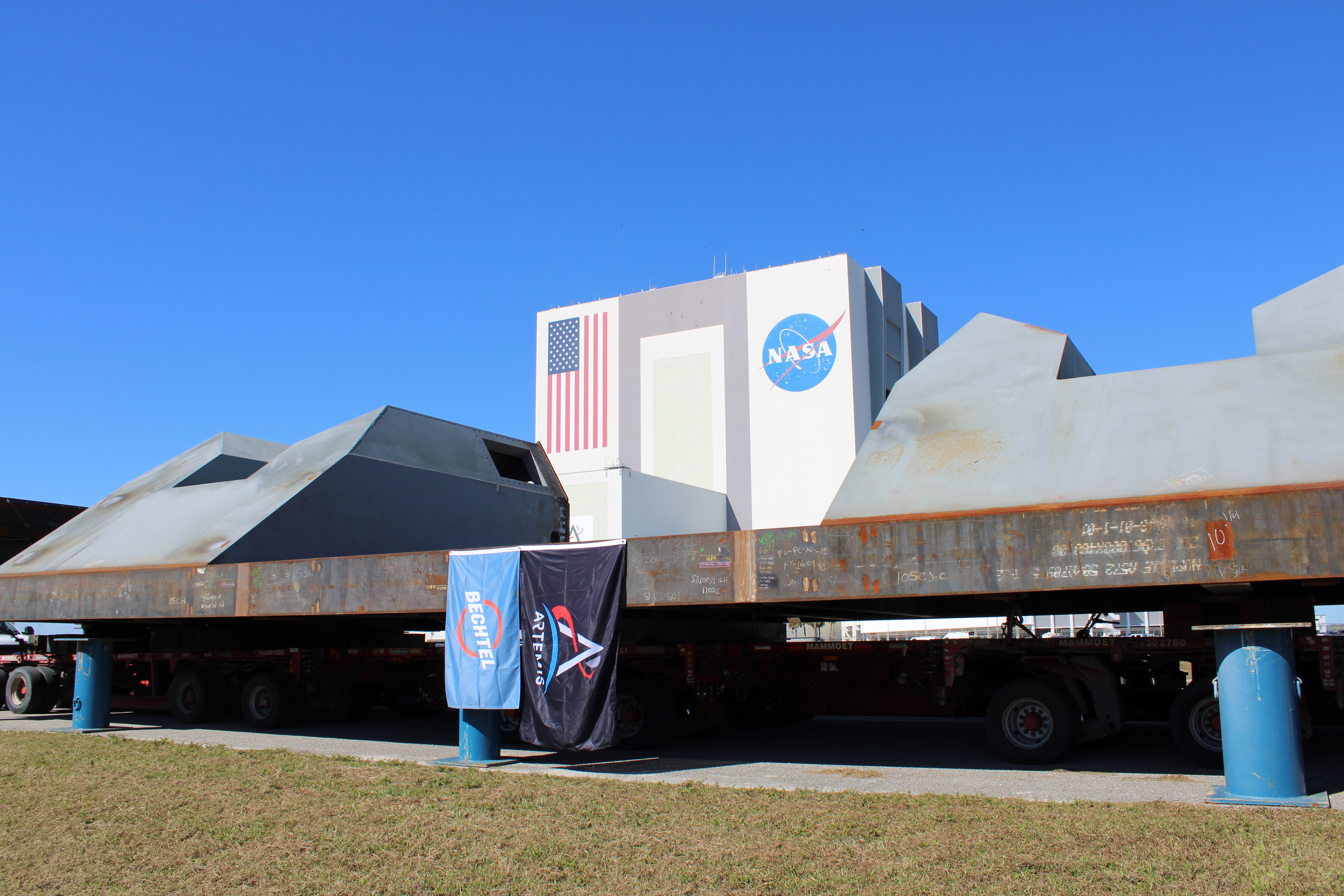 Bechtel flag flies next to Artemis flag on truss girder 1.1.1 after arrival to Kennedy Space Center.