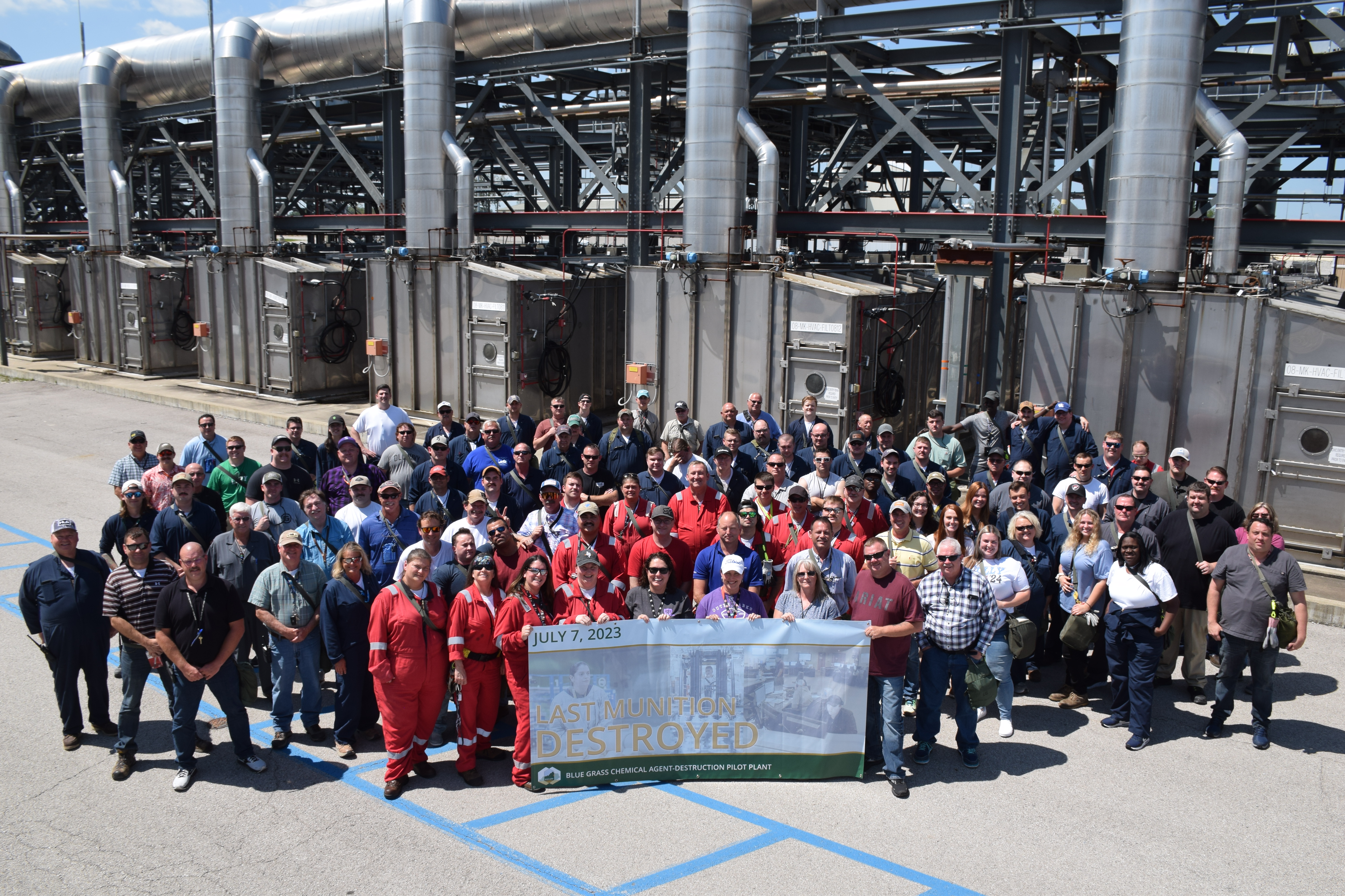 Members of the Blue Grass Chemical Agent-Destruction team pose for a group photo following destruction of the last weapon on July 7, 2023. 