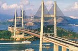 The new transportation corridor from Hong Kong Island to the airport included two tunnels, two bridges and a six-lane expressway