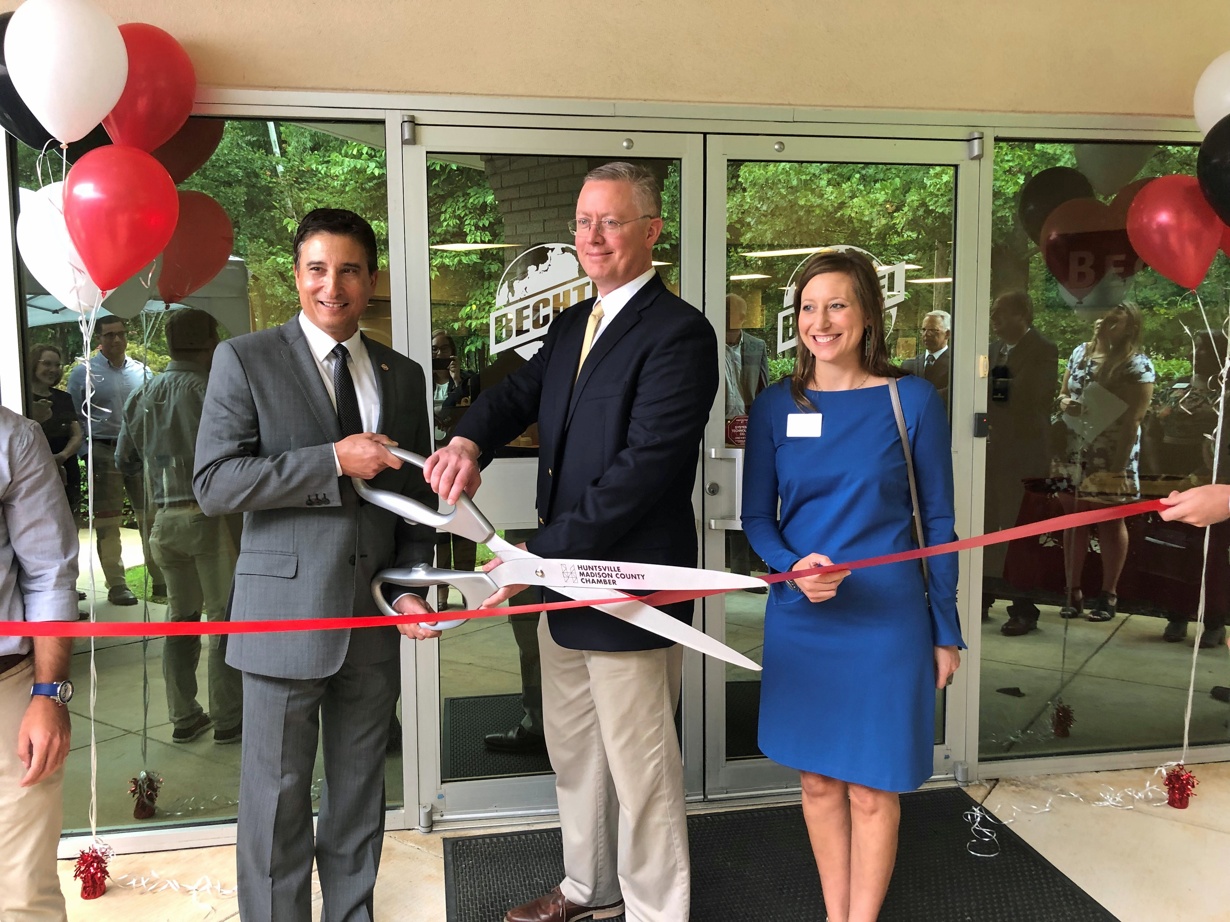 Bechtel’s Defense and Space General Manager Mike Costas and Engineering Manager Nathan McAdams, and Amber Greenwood of the Huntsville/Madison County Chamber cut the ribbon on the Bechtel Huntsville Office.