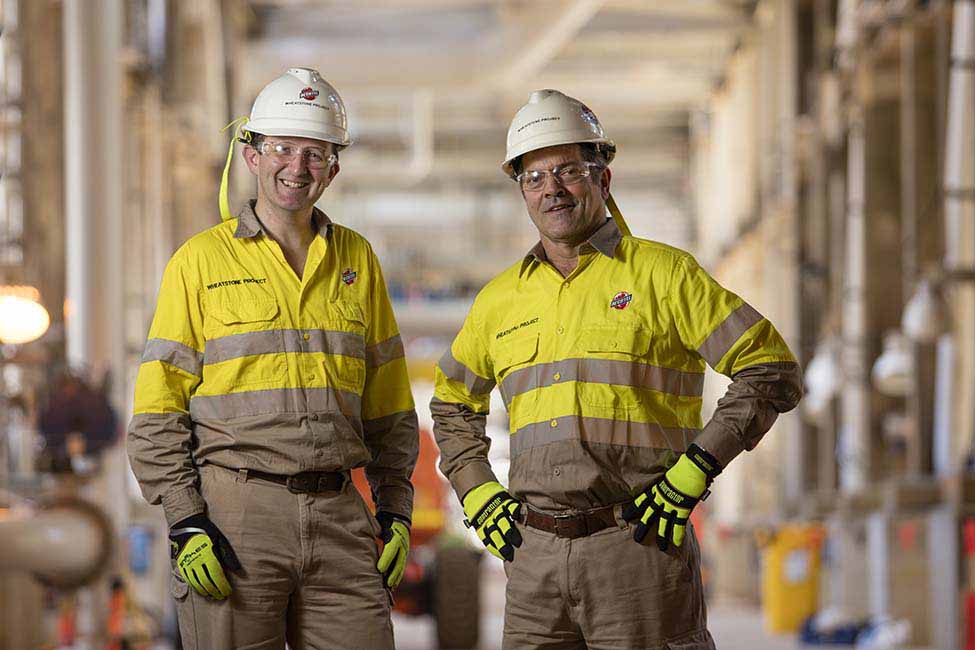 two employees pose at Wheatstone