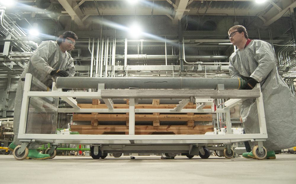 Workers move the last GB rockets from a pallet onto a cart before the munitions are processed in the Blue Grass plant. More than 101,000 rockets and projectiles were destroyed at the Blue Grass Army Depot from June 6, 2019 through July 7, 2023.  