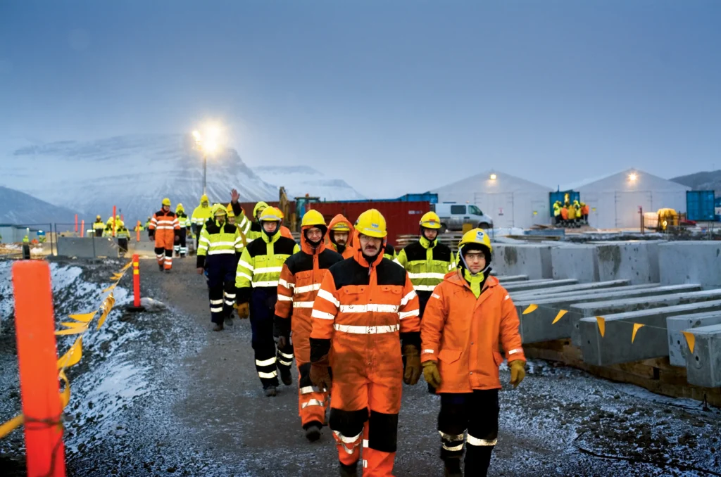 Fjarðaál Aluminum Smelter Workers in a line