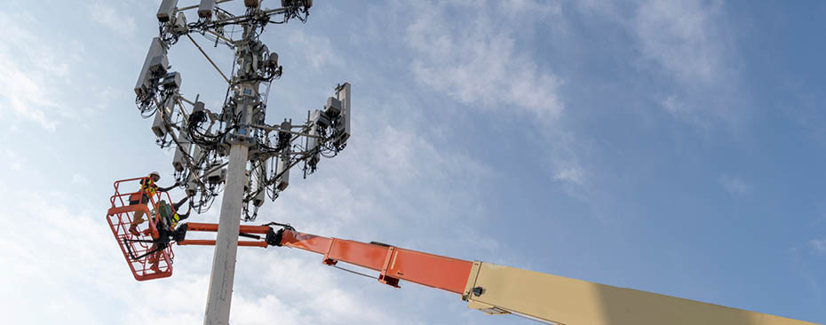 ANAHEIM, CALIFORNIA - MARCH 25: A Bechtel employee performs maintenance on a cell tower in Anaheim.