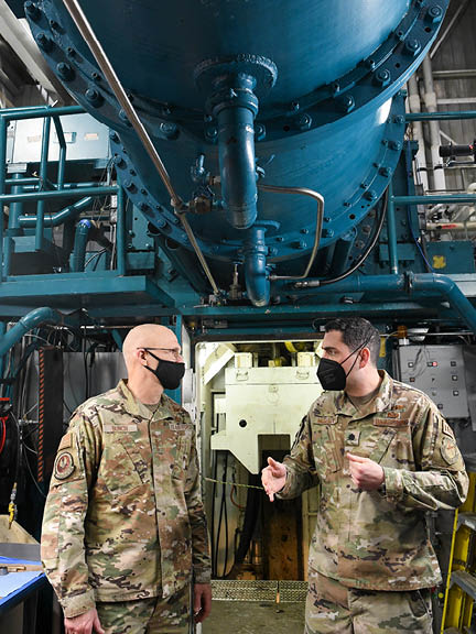 Lt. Col. John McShane, chief, Aerodynamics Test Branch, Test Division, Arnold Engineering Development Complex (AEDC), speaks with Gen. Arnold Bunch Jr., commander, Air Force Materiel Command, while showing him around Tunnel B of the von K rm n Gas Dynamics Facility at Arnold Air Force Base, Tenn., headquarters of Arnold Engineering Development Complex, Jan. 27, 2022. (U.S. Air Force photo by Jill Pickett)